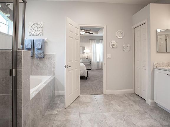 Luxuriate in your spa-like en-suite owner s bath - Willow II with Loft home plan by Highland Ho