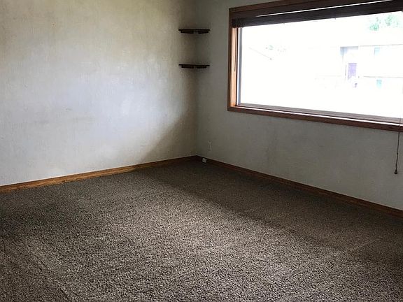 Front room looking toward window that faces the street