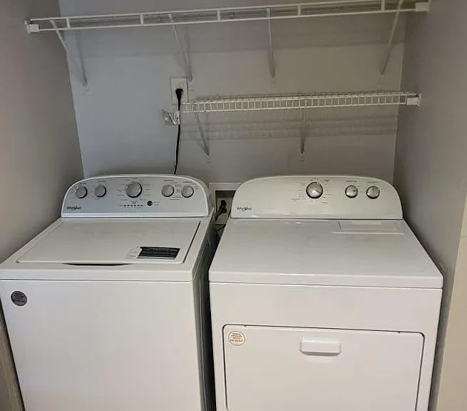 Washer and dryer inside the unit