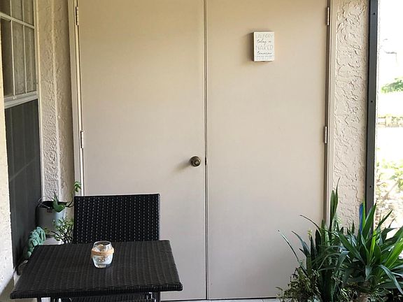 Washer and dryer in room off the screened porch.