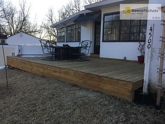 New cedar deck with water feature by front door - great for ente