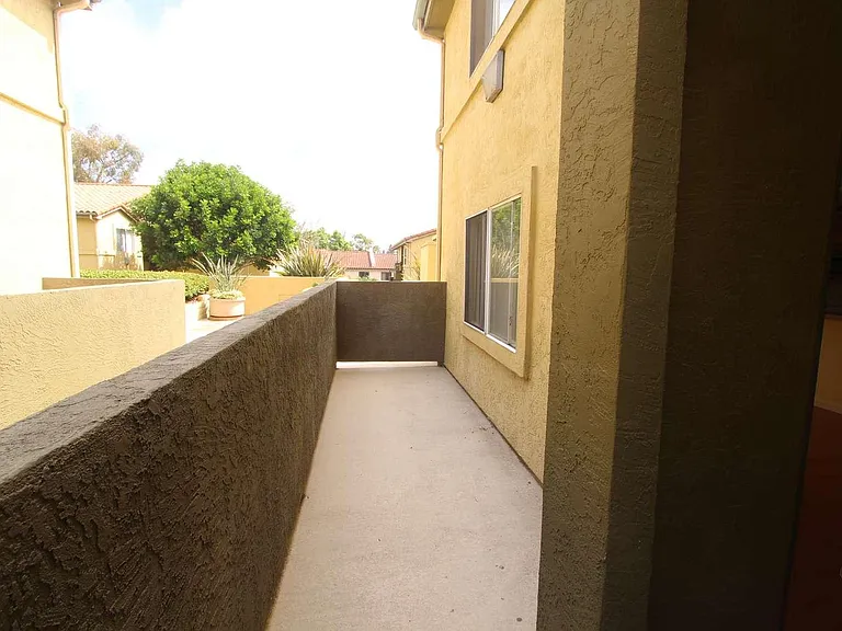 7545 Charmant Dr — Photo 8