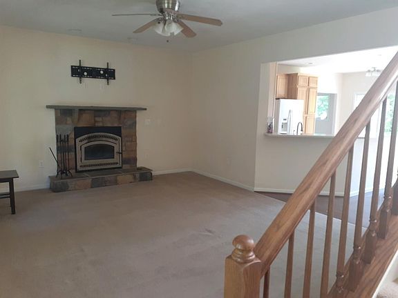 Living Room with Wood Burning Fireplace