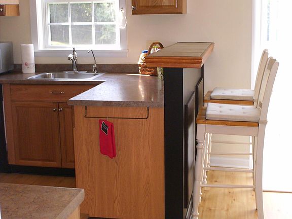 Eat-in kitchen bar! Loads of light!