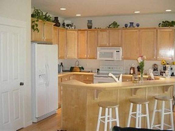Wonderful kitchen with maple floors and cabinets