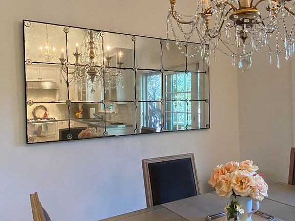 High ceilings with windows and light make for a fresh and clean feel.