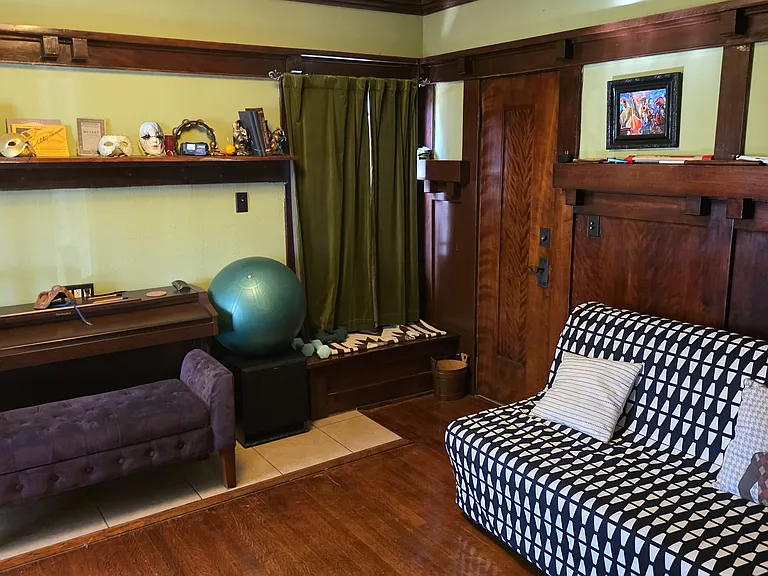Music / workout room with futon for overnight guests