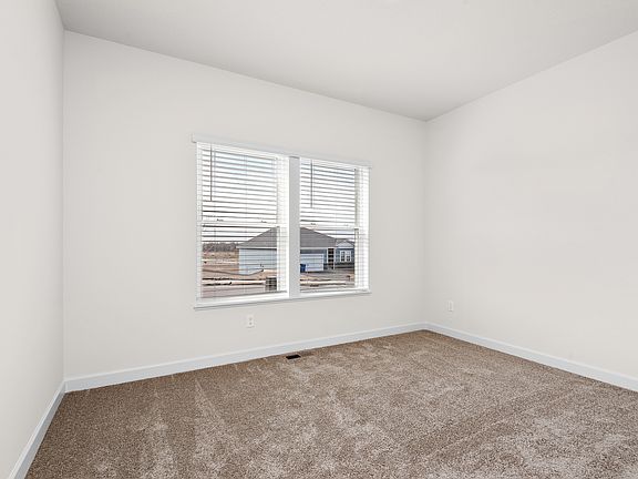 The secondary bedroom has carpet.