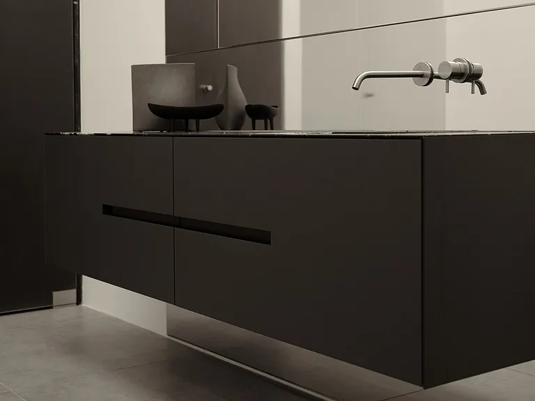 Floating Double Vanity with Seamless Integration _ This sleek, wall-mounted vanity features a handle-free design, soft-close cabinetry, and integrated stone countertops.