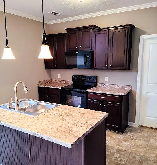 The kitchen features an island.