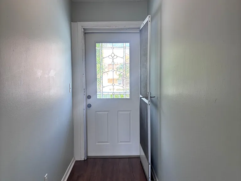 Entry hall with brand new doors on all condos.