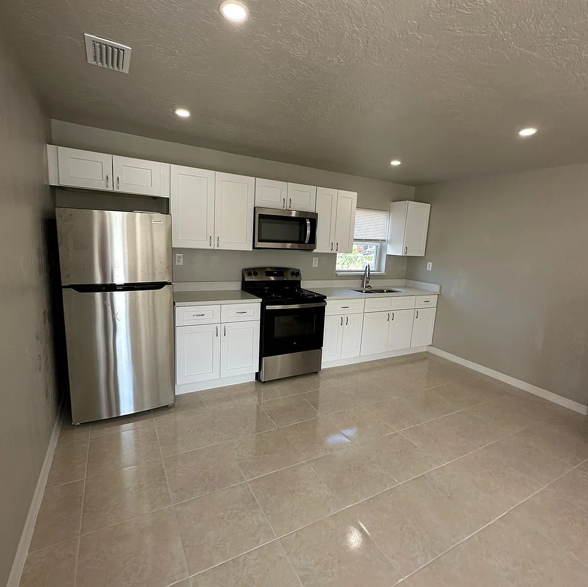 11430-32 Kimble Dr - Quad — Photo 1