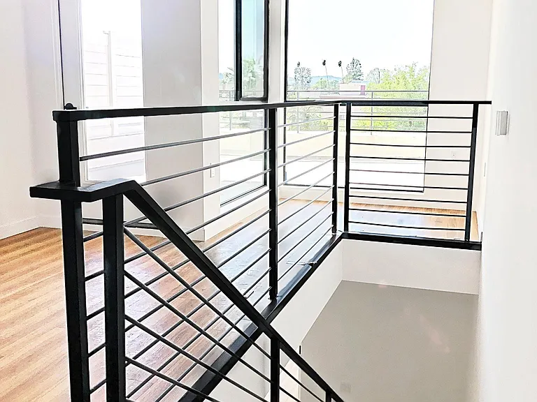 Roof level. Flex space, home office, workout area. Overlooks your private rooftop patio
