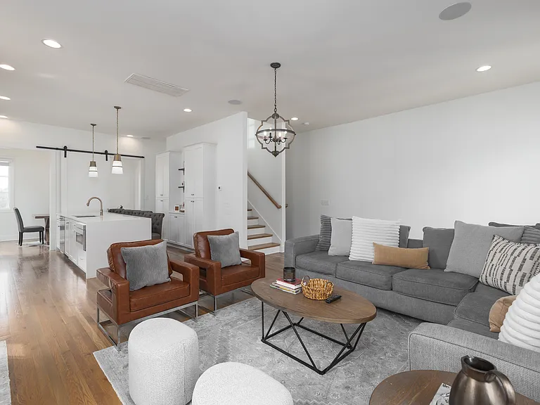 Cozy living room with comfortable seating, a fireplace and a Smart TV.