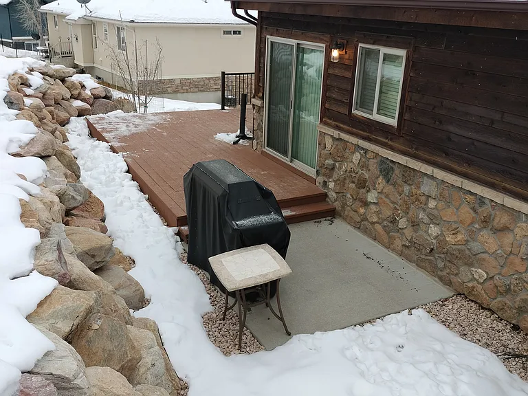 Enjoy grilled food on the outdoor Barbecue located by the wrap around deck