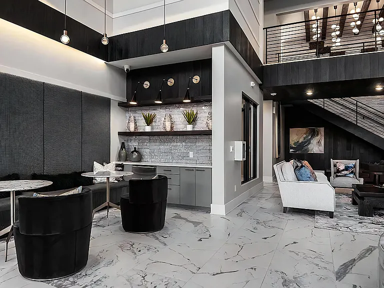Community Lounge Featuring High Ceilings and Marble Floors