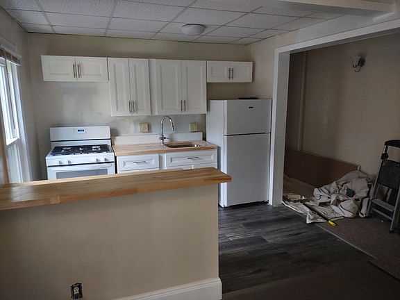 Kitchen is still getting worked on and will have a microwave and backsplash