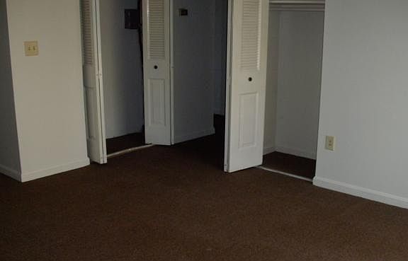 living room with extra closet