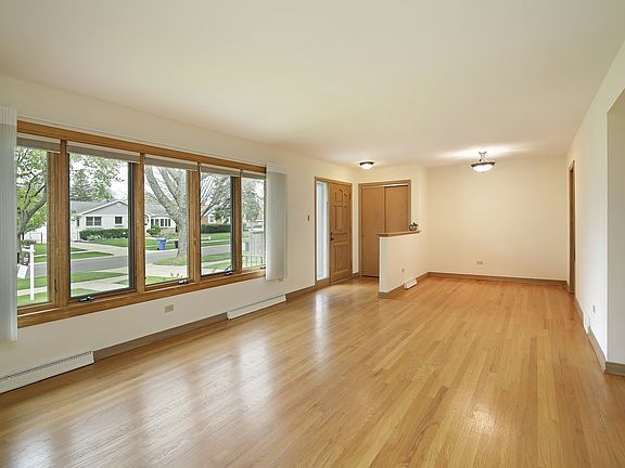 Dining Room is combined with living room. Located conveniently off the kitchen.