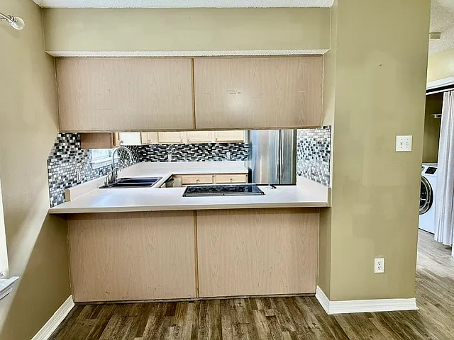 View of kitchen from dining nook