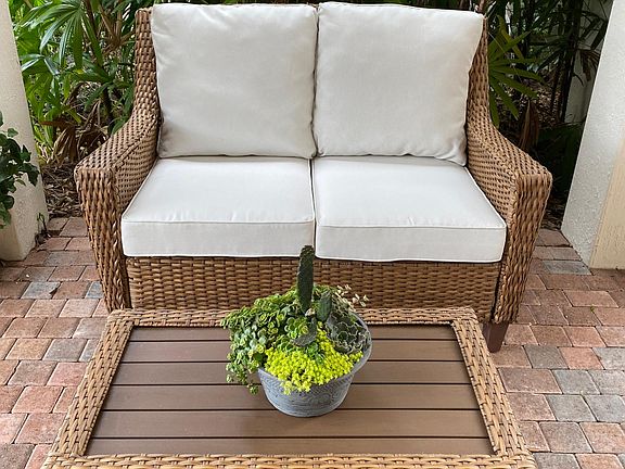 Covered patio area near front door.