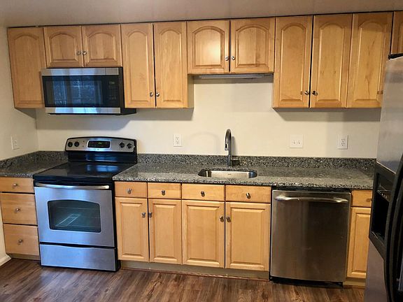 updated kitchen - luxury vinyl planking, granite, stainless 