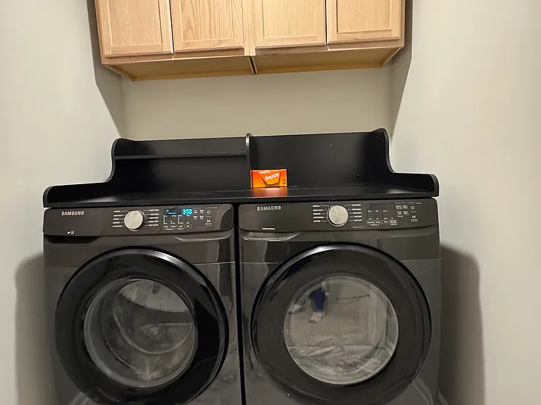 Laundry Room:
* Includes Black Samsung 7.5-Cu. Smart Front Load Washer & Dryer