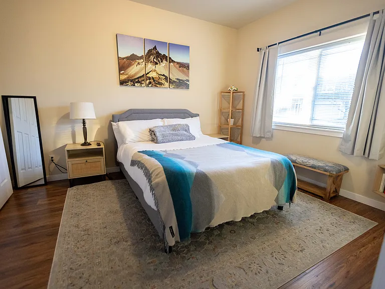 Large guest bedroom with large barn door slider closet