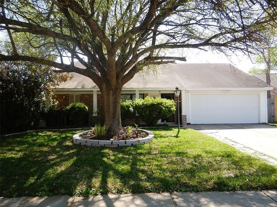 The mature landscaping enhances the beautiful curb appeal!