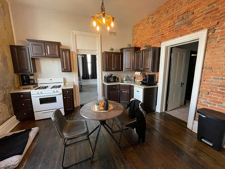Exposed brick in modern kitchen