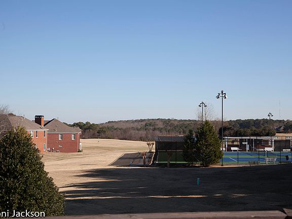 UPPER VIEW OF TENNIS COURT