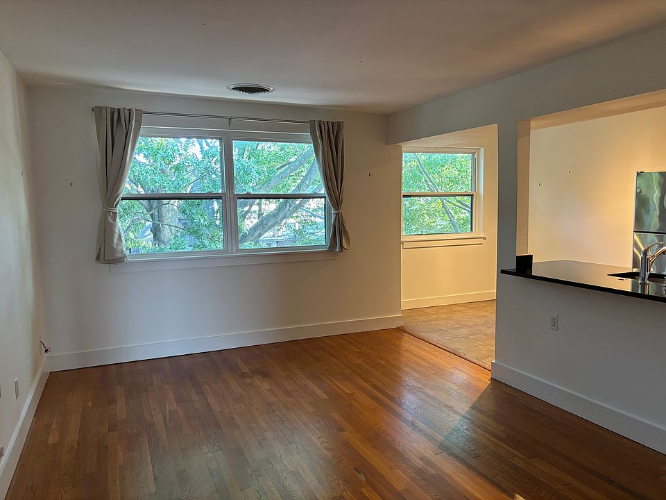 Spacious living room with great natural light and open floor plan.