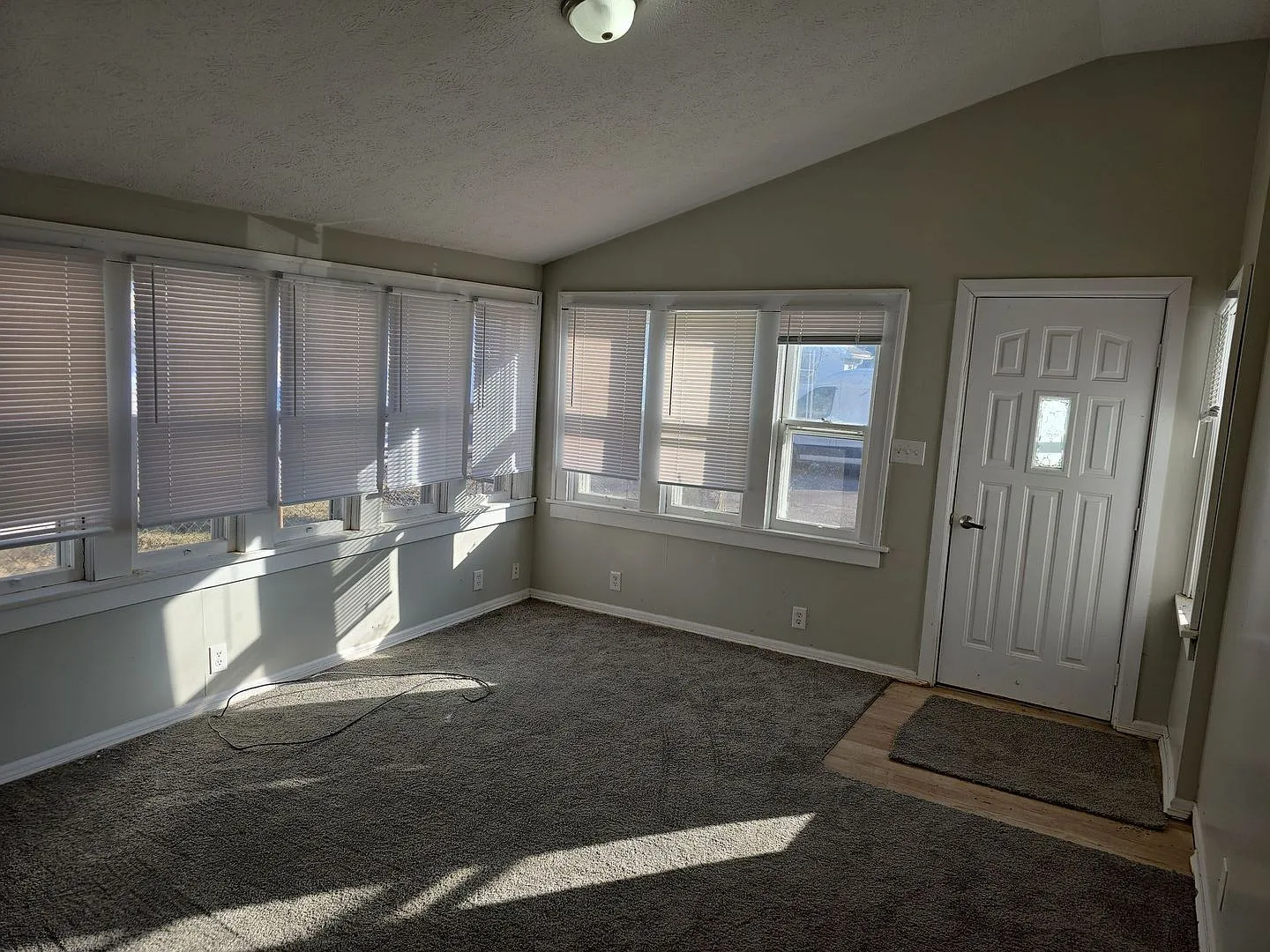 1506 W 10th St - Charming 4BR Home with Sunlit Rooms & Spacious Living Areas — Photo 3