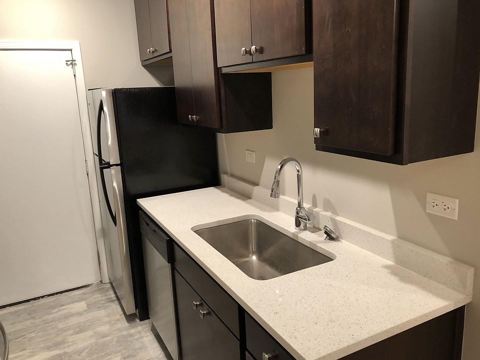 Modern Galley Kitchen with Stainless Steel Appliances