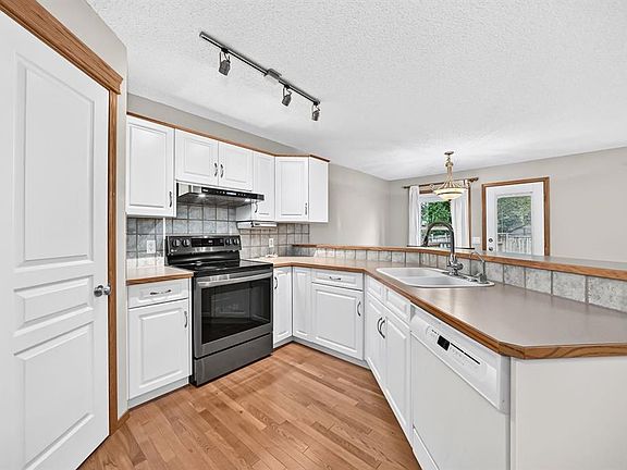 5th image of 234 E Somerglen Way SW