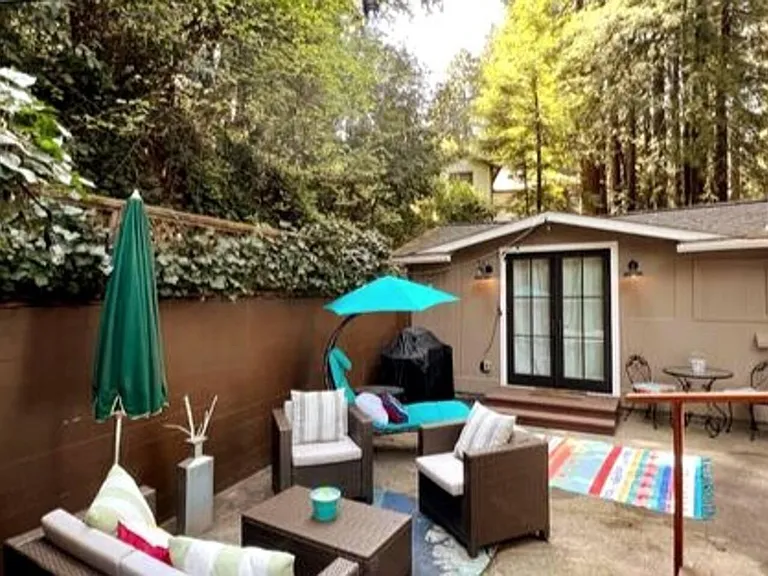 One bedroom French doors leading onto patio.