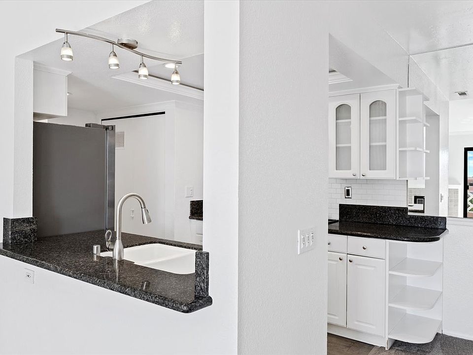 1st image of 9469 Fairgrove Ln Unit 303