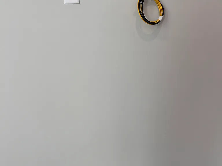 LAN and HDMI cable routed inside the wall for TV