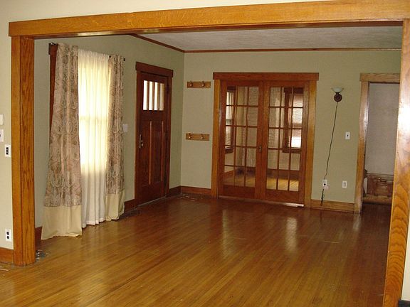 Living room with french doors leading to office
