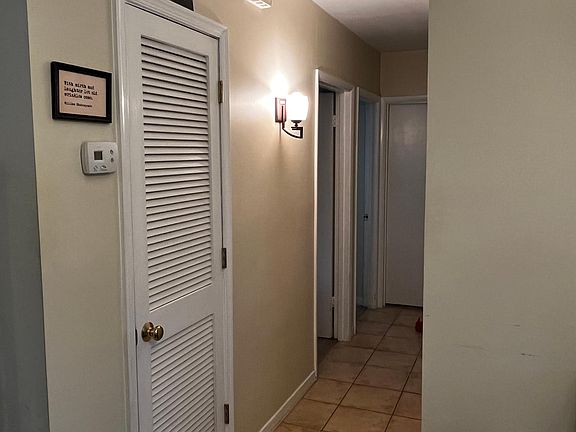 hallway with ceramic tile