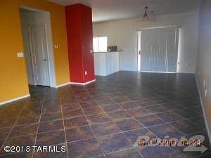Living rm toward kitchen accent Tile