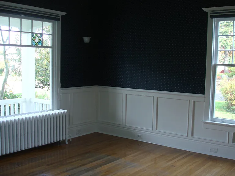 Living Room with Wainscotting
Note the Stained Glass Windows
Orginal Radiator uses Radiant Heat