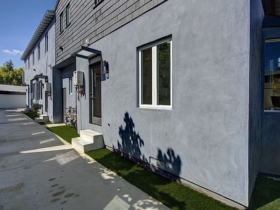 Long driveway leads to 1 vehicle parking in garage