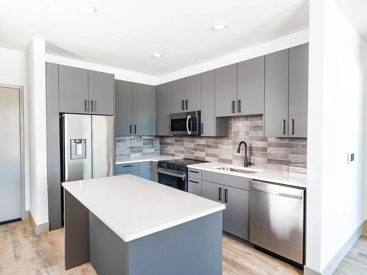 Modera Chandler features modern kitchens with multiple finish options, sleek cabinetry, and a functional island for everyday living. - Modera Chandler