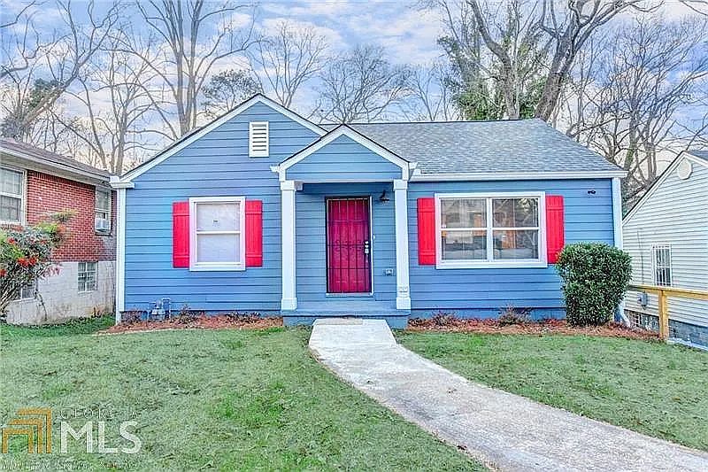 Bold colors, private rooms, and a prime location_this home has it all.