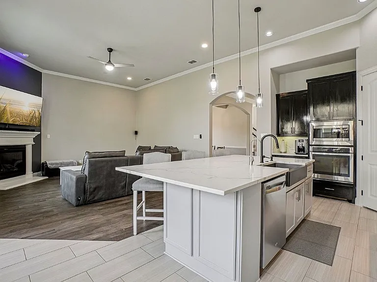 Opens to the kitchen, living room and breakfast nook