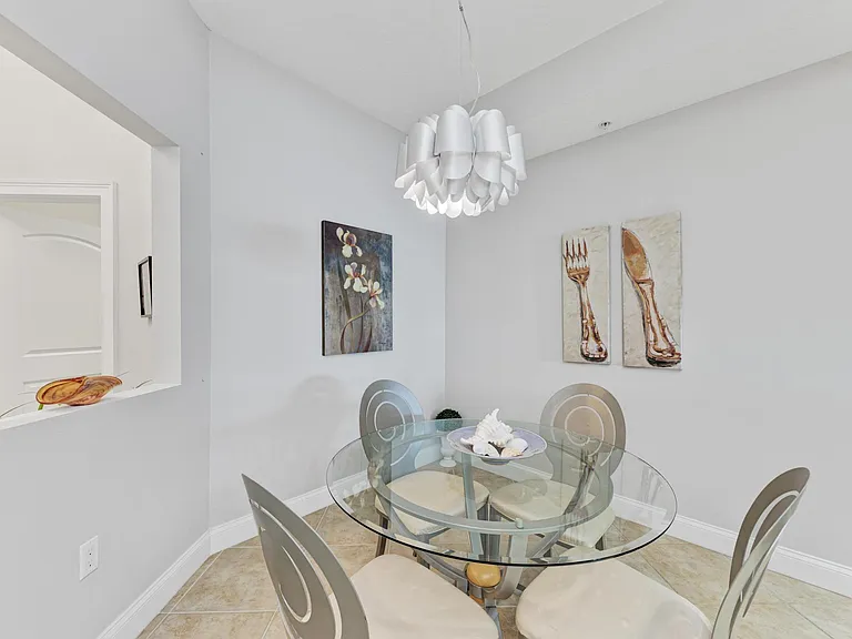 611 Riviera Dunes Way #304 — Photo 11