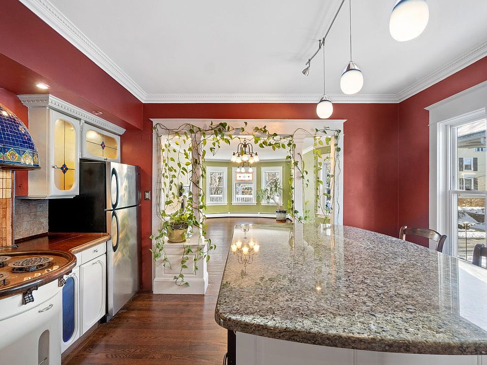 View from the kitchen into the living and dining room.