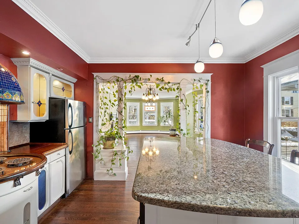 View from the kitchen into the living and dining room.