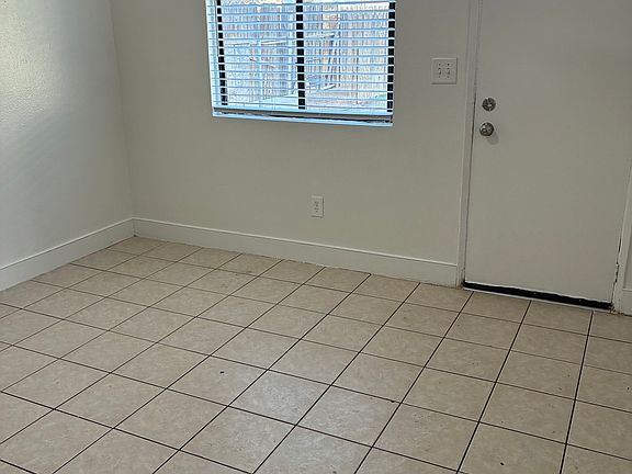 Kitchen looking to backyard